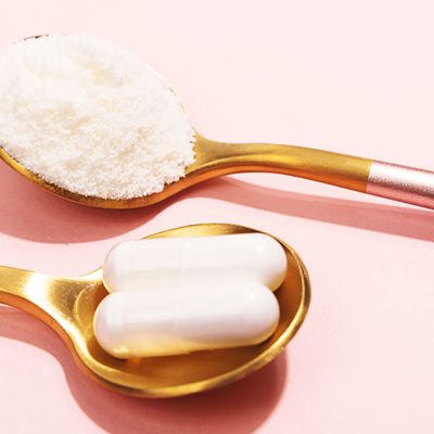 Collagen,Powder,And,Pills,On,Pink,Background.,Extra,Protein,Intake.